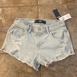 Hollister, size 00, light blue jean shorts. New with tags.